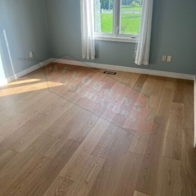 installing engineered hardwood floors in bright home