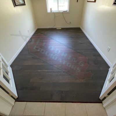 house replaces carpet with laminate flooring