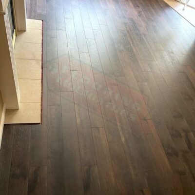 house replaces carpet with laminate floors
