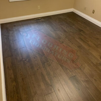 dark engineered hardwood floors installed in home