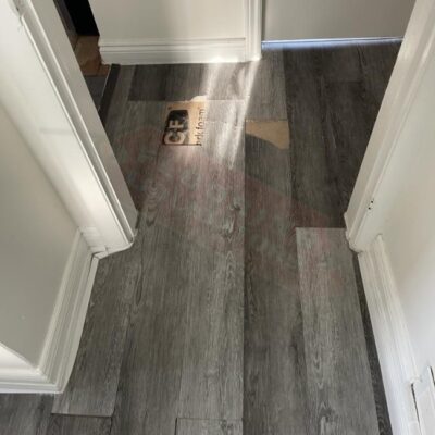 replacing vinyl click flooring in small home