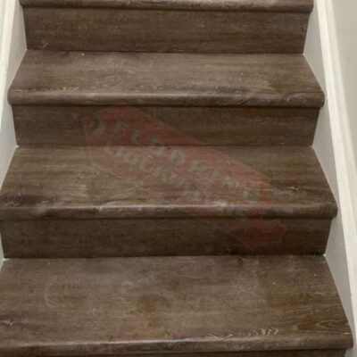 old carpet floors replaced with bright vinyl floors