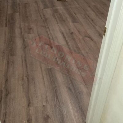 old carpet replaced with bright vinyl floors